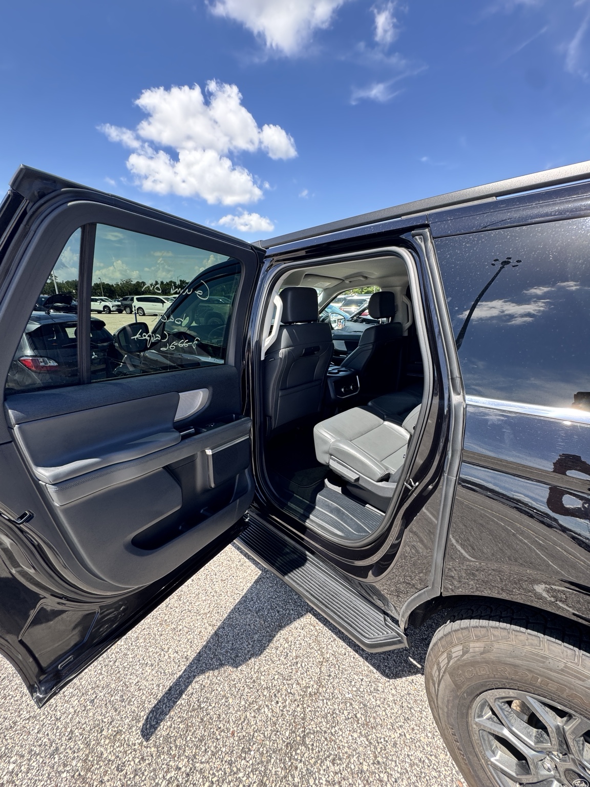 SUV with rear door open for interior detailing