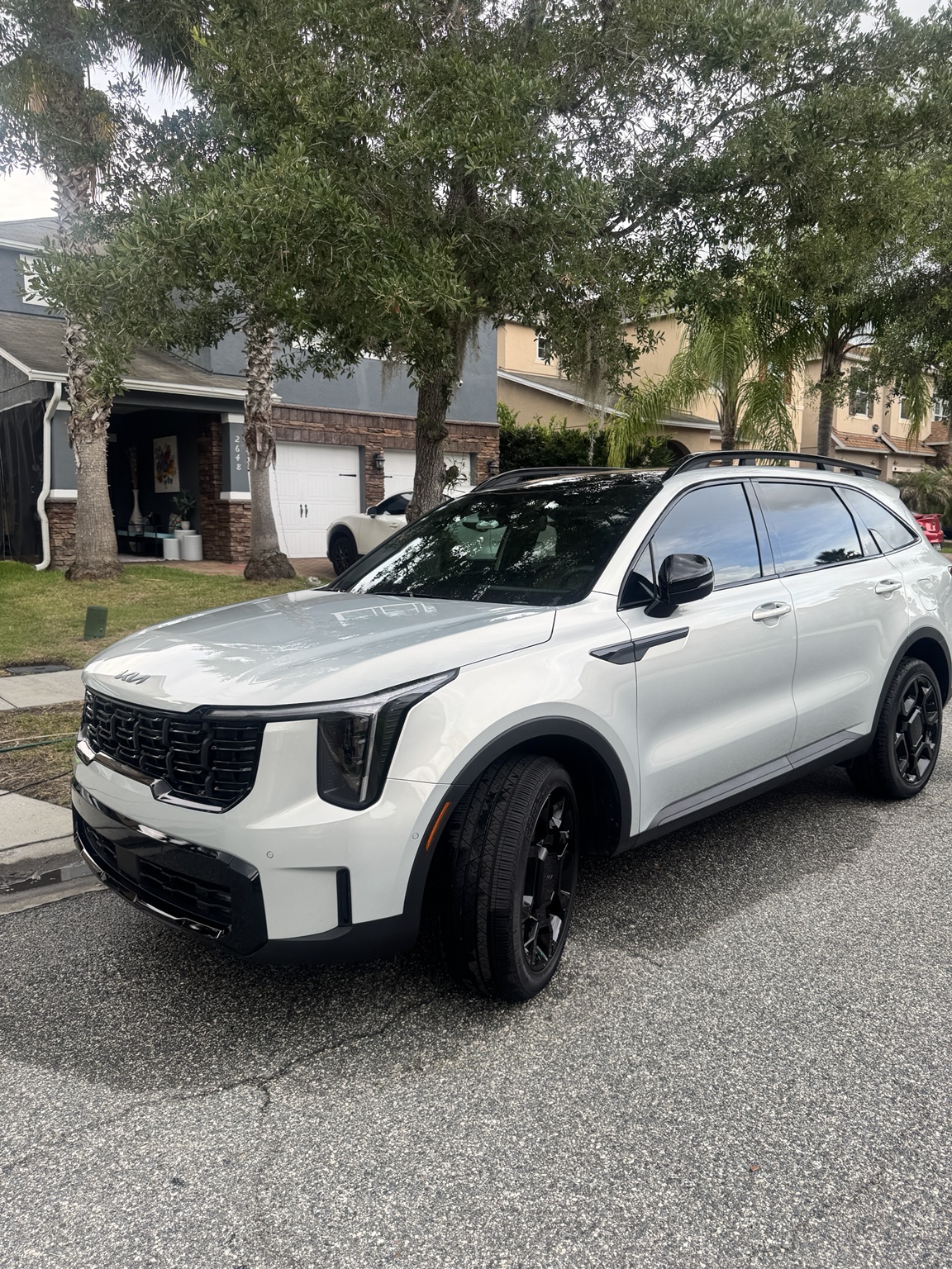 White SUV parked after detailing