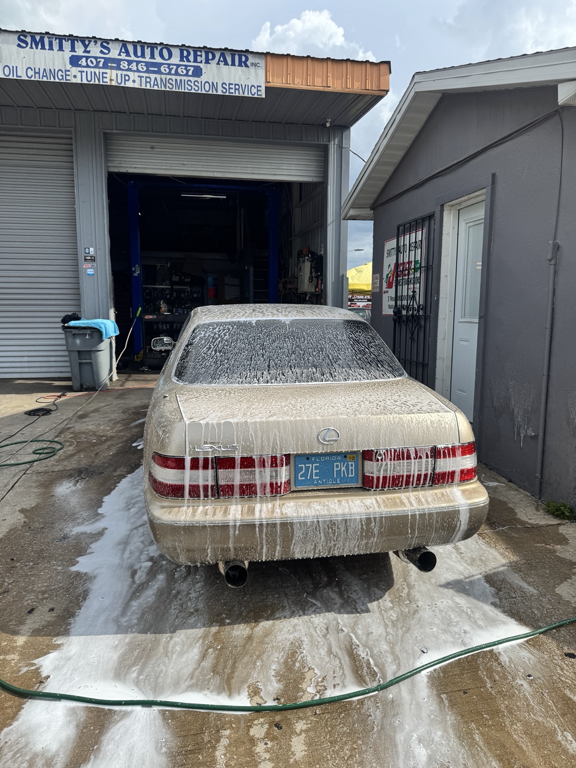 Lexus sedan during an exterior wash